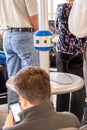 Charging station being used by passengers in an airport