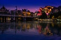 London, UK. 22nd May 2017. Charing Cross Station and Golden Jubilee footbridge reflect in the River Thames at night Royalty Free Stock Photo