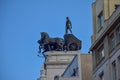 the chariot monument on the roof of the house. Madrid