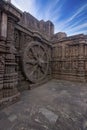 A chariot wheel carved into the wall of the 13th century Konark Sun or Surya Temple, Odisha, India. Royalty Free Stock Photo