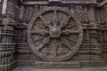 A chariot wheel carved into the wall of the 13th century Konark Sun Temple, Odisha, India. Royalty Free Stock Photo