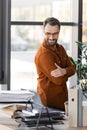 charismatic businessman in eyeglasses and shirt