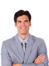Charismatic businessman with folded arms Royalty Free Stock Photo