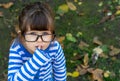 Charismatic child showing shush gesture hiding secret preparing surprise standing friendly and enthusiastic, Royalty Free Stock Photo