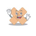 A charismatic cross bandage mascot design concept smiling and waving hand