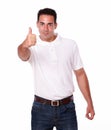 Charismatic hispanic guy with ok gesture