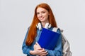 Charismatic lovely teenage college girl, redhead female student with notebooks and papers, prepare project for todays