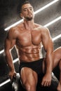 Charismatic male model with a muscular bare torso Royalty Free Stock Photo