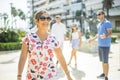 Charismatic woman in front of a group of young people Royalty Free Stock Photo