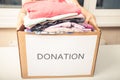 Charity and assistance to the poor, homeless, and needy. Second hand clothing donation box