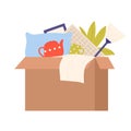 Charity box full of household stuff Royalty Free Stock Photo