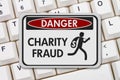 Charity fraud danger sign with a thief