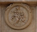 Charity Medallion on the Palazzo Montecitorio, seat of the Italian Chamber of Deputies in Rome