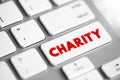 Charity - an organization set up to provide help and raise money for those in need, text concept button on keyboard Royalty Free Stock Photo