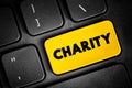 Charity - an organization set up to provide help and raise money for those in need, text concept button on keyboard Royalty Free Stock Photo