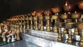 Charity. Praying candles in a monastery in Bhutan. Royalty Free Stock Photo