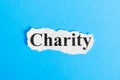 charity text on paper. Word charity on a piece of paper. Concept Image Royalty Free Stock Photo