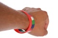 Charity wristbands on wrist cutout Royalty Free Stock Photo