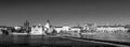 Charles bridge and Prague Castle panorama. Capital of the Czech republic. Sunny day. Black and white photo