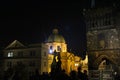 Charles Bridge Prague. Night Prague. People in front of the St. Salvator Church and St. Francis of Assisi Church, Prague. Royalty Free Stock Photo