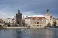 Charles Bridge Prague with Police boat on patrol Royalty Free Stock Photo