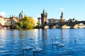 Charles bridge and swans on Vltava river, Prague, Czech Republic Royalty Free Stock Photo