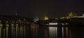 Charles Bridge Tower Bridge river at night Prague Royalty Free Stock Photo