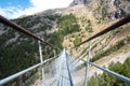 Charles Kuonen suspension bridge in Swiss Alps. With 494 metres, it is the longest suspension bridge in the world in Royalty Free Stock Photo