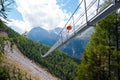 Charles Kuonen suspension bridge in Swiss Alps. With 494 metres, it is the longest suspension bridge in the world in Royalty Free Stock Photo