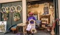 African-American woman in front of her store Sweetgrass Baskets in Charleston, SC