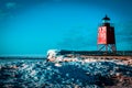 Charlevoix, MI /USA - March 3rd 2018: Charlevoix Michigans South Pier Lighthouse frozen over in winter