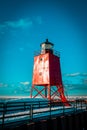 Charlevoix, MI /USA - March 3rd 2018:Prime look at bold red South Pier Lighthouse in Charlevoix Michigan in winter