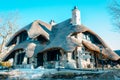 Charlevoix, MI /USA - March 3rd 2018:  The Thatch House an Earl Young Mushroom House in Charlevoix Michigan Royalty Free Stock Photo