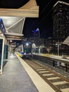 A Charlotte CATS LYNX Blue Line Light Rail Train at 9th Street Station at night. Royalty Free Stock Photo