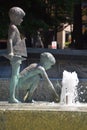 Children Playing in a Fountain bronze statues