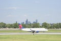 Airplane on the runway of the Charlotte-Douglas Airport in Charlotte, NC. Royalty Free Stock Photo