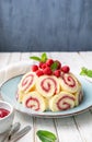 Charlotte royale cake filled with raspberry jam and decorated with fresh berries Royalty Free Stock Photo