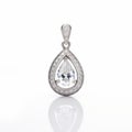 Pear Shaped Diamond Pendant With Hollow Halo Design In 18k White Gold Royalty Free Stock Photo