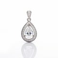 Pear Shaped Diamond Pendant With Hollow Halo Design In 18k White Gold