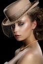 Charm. Retro Styled Romantic Woman in Vintage Brown Hat and Veil. Nostalgia