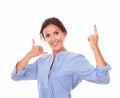 Charming adult lady with call gesture pointing up Royalty Free Stock Photo