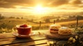 An charming afternoon tea spread featuring a scone, jam, cream, and tea. Royalty Free Stock Photo
