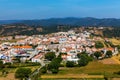 Charming architecture of hilly Aljezur, Algarve, Portugal. View to the small town of Aljezur with traditional portuguese houses Royalty Free Stock Photo