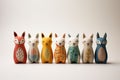 A charming array of foxes in vibrant colors and assorted patterns is neatly arranged against a clean white backdrop.