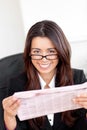 Charming asian businesswoman holding a newspaper Royalty Free Stock Photo