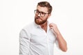 Charming attractive bearded man in eyeglasses