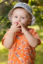 Charming babe eats delicious apple Royalty Free Stock Photo