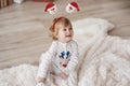 Charming baby in Christmas time