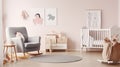 Charming Baby Oasis: Rocking Horse and Delicate Pink Touches in a Bright Scandinavian Nursery. Generative AI Royalty Free Stock Photo