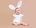 Charming baby sitting in costume easter bunny Royalty Free Stock Photo